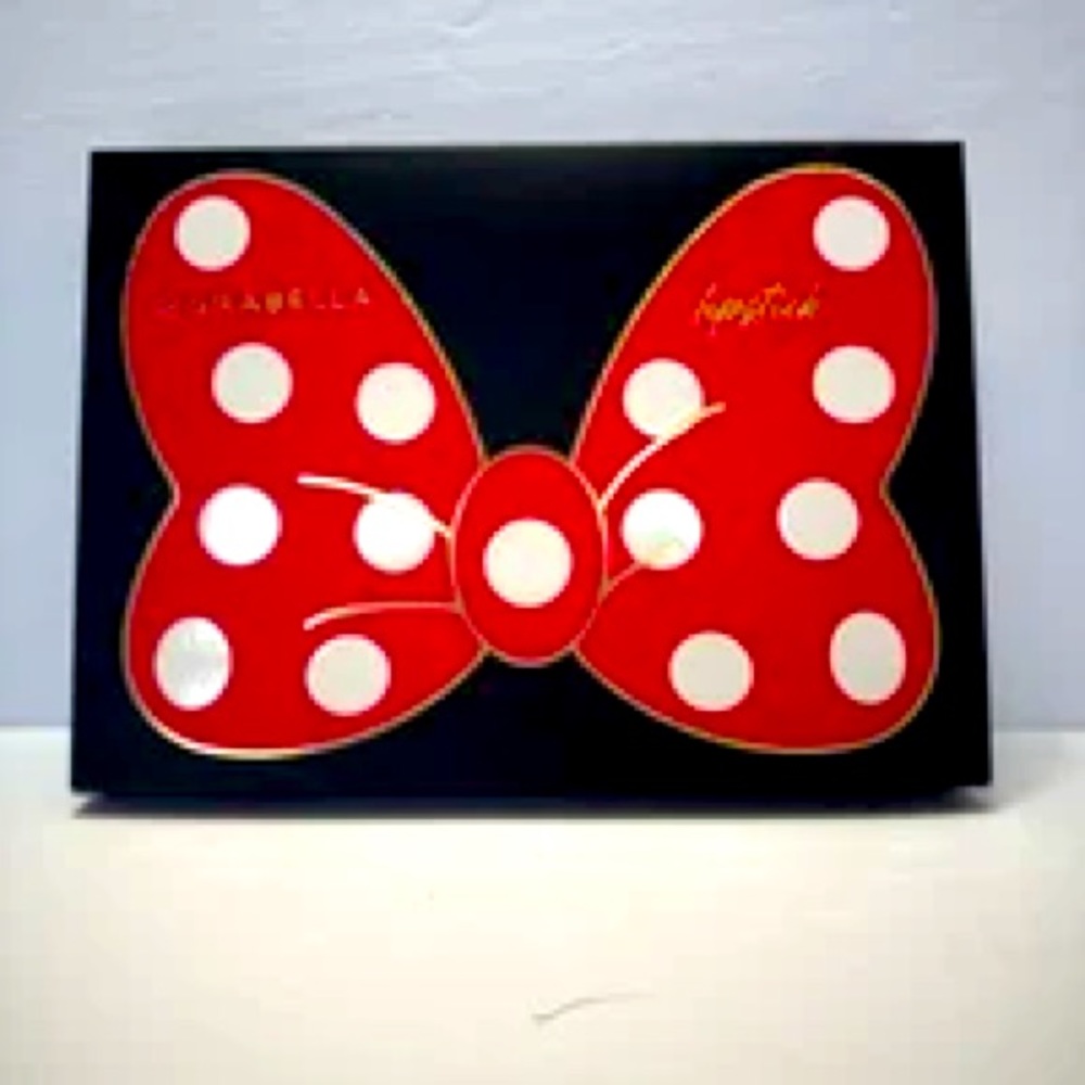 Girabella set of 8 lipsticks in a “Minnie Mouse bow” shaped box.